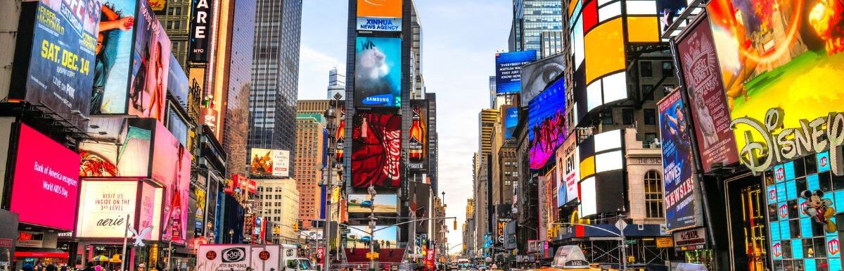 A busy tourist intersection of neon art and commerce and is an iconic street of New York City and America.
