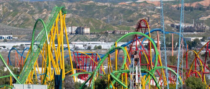 Wide view of colorful roller coaster ride in Six Flags Magic Mountain.