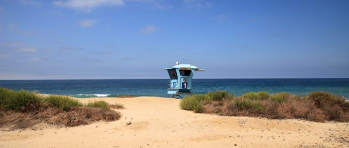 View of a lifeguard tower at the San Clemente State Beach in California during the summer.