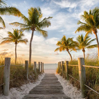 Footbridge to the Smathers beach on sunrise Key West, Florida, USA.