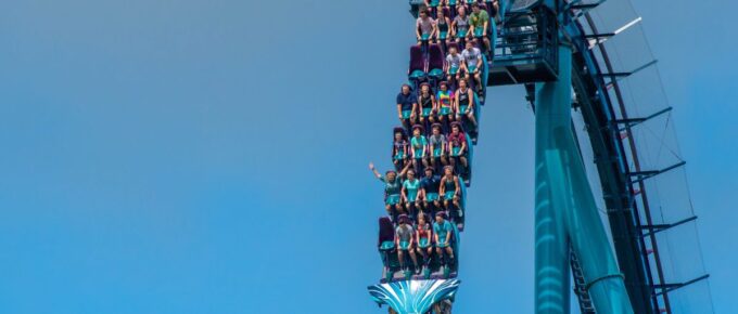 People having fun riding Mako rollercoaster during summer vacation at Seaworld, Orlando, Florida, USA.