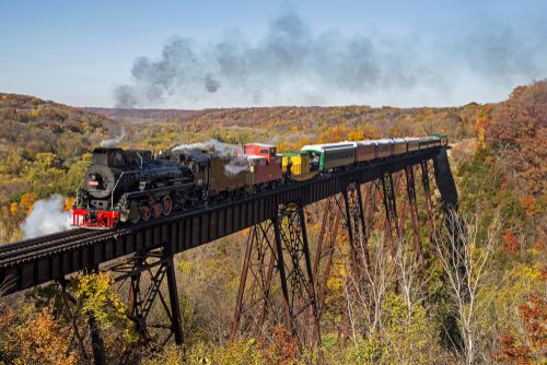 A train crossing a bridge at Boone Scenic Valley Railroad.